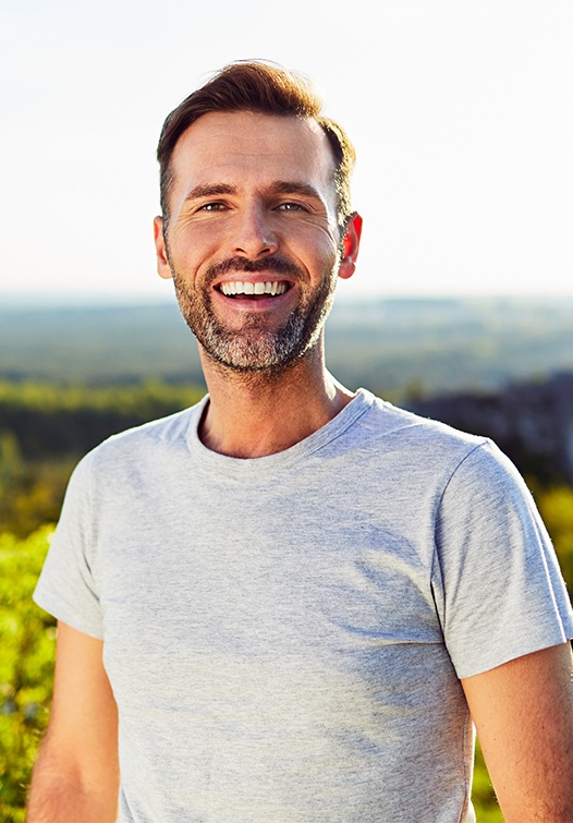 Man outdoors smiling
