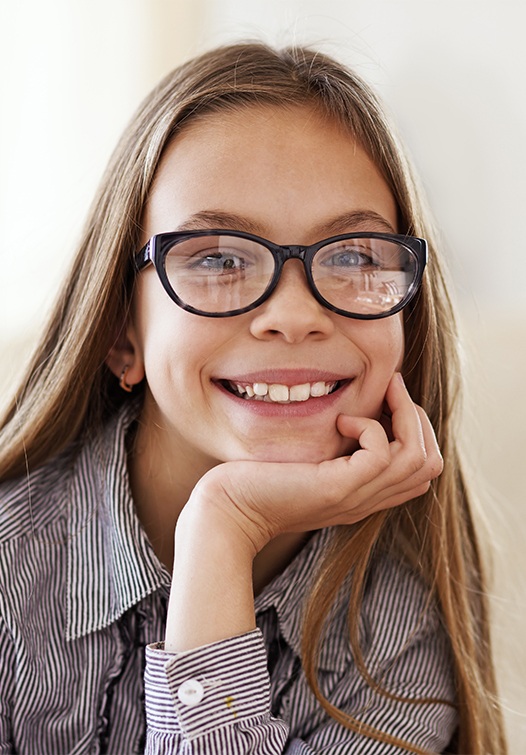 Young girl sharing healthy smile