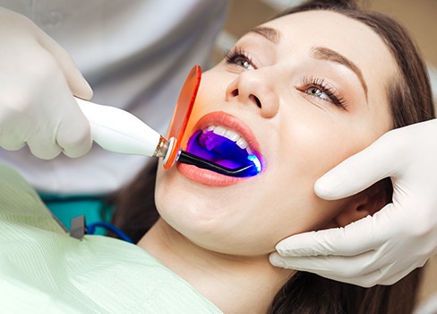 Patient receiving dental bonding