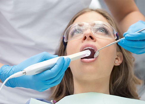 Dentist capturing intraoral images